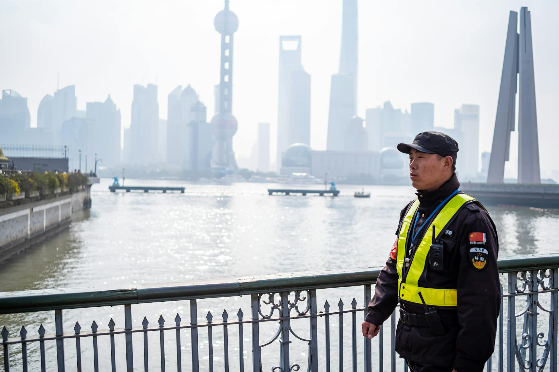 police officer on bridge in shanghai